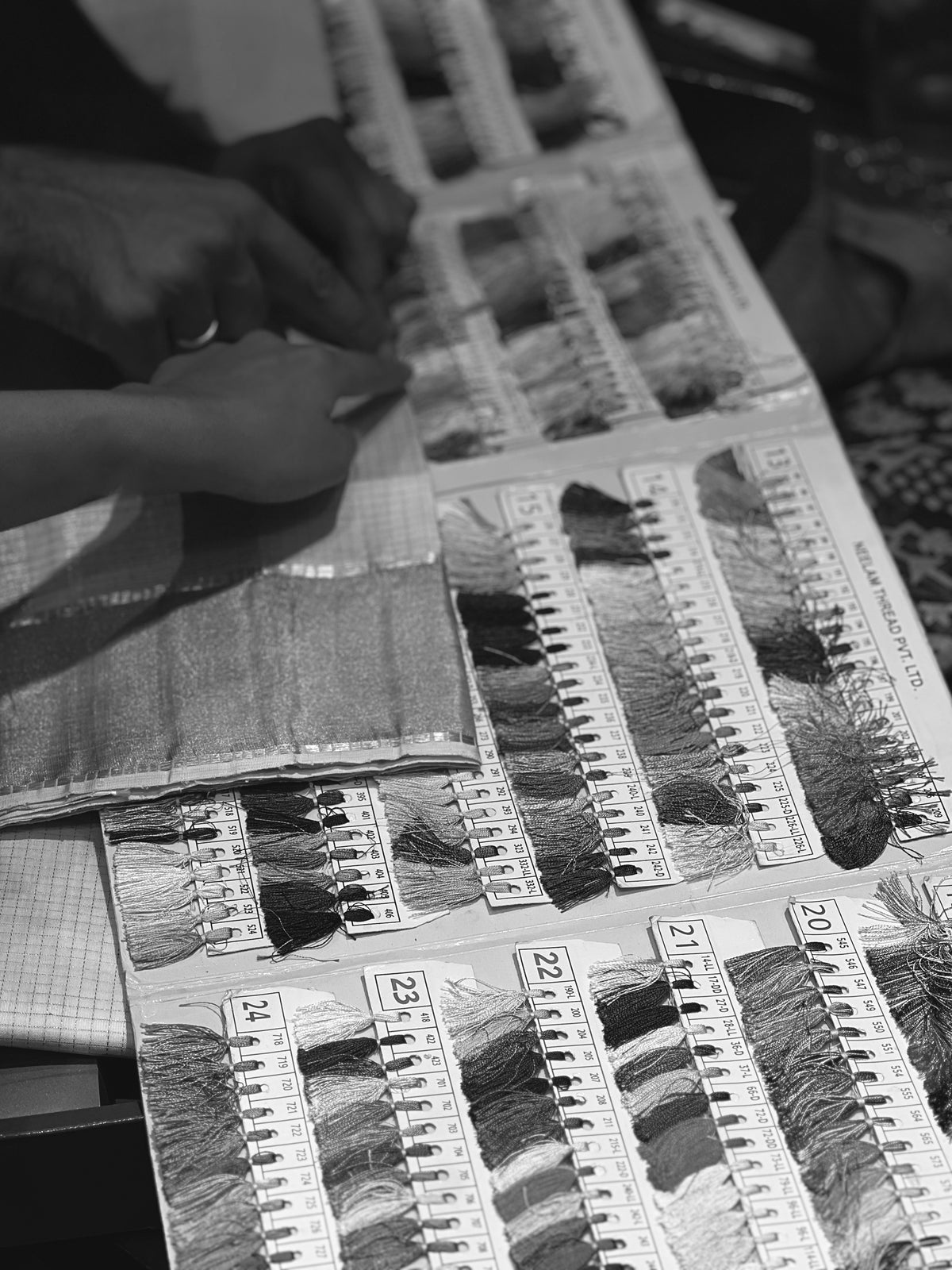 A full bespoke consultation.
In a working cloth merchant's room.